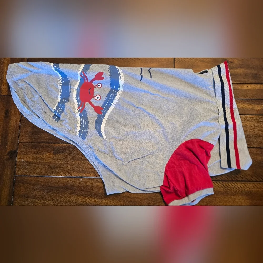 Stylish Gray Dog Polo Shirt with Red and Blue Accents